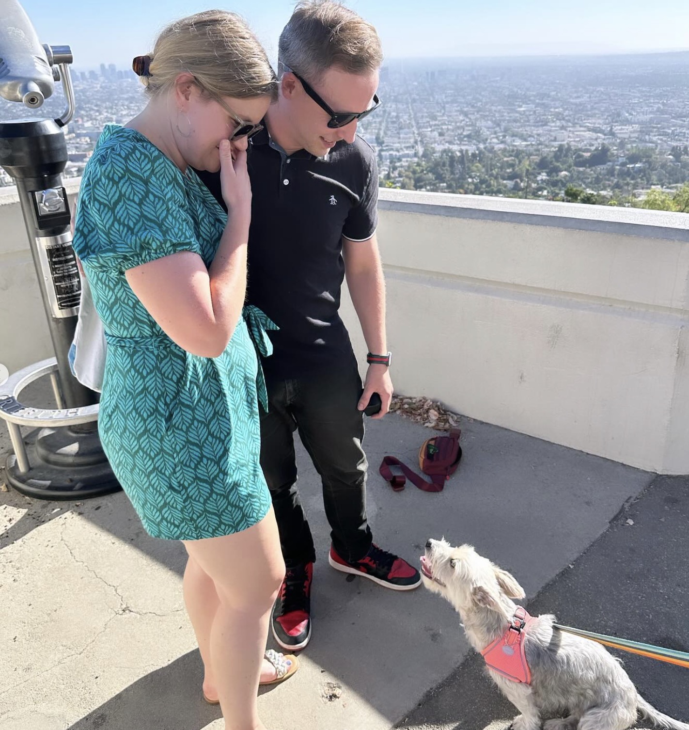 Johnny and Marie sharing a moment with their dog