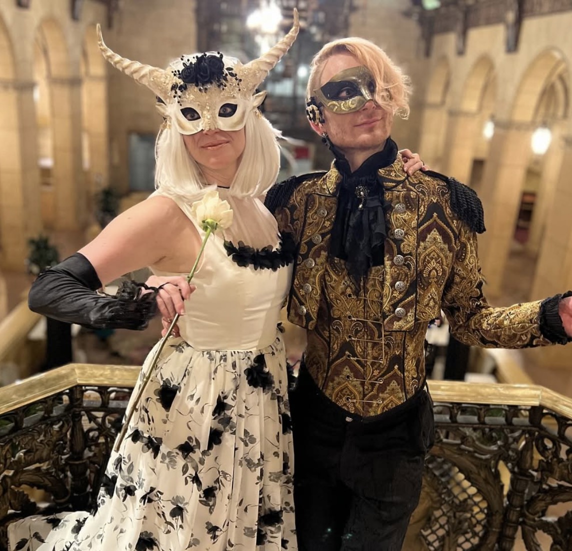 Christine and Jordan dressed for a masquerade